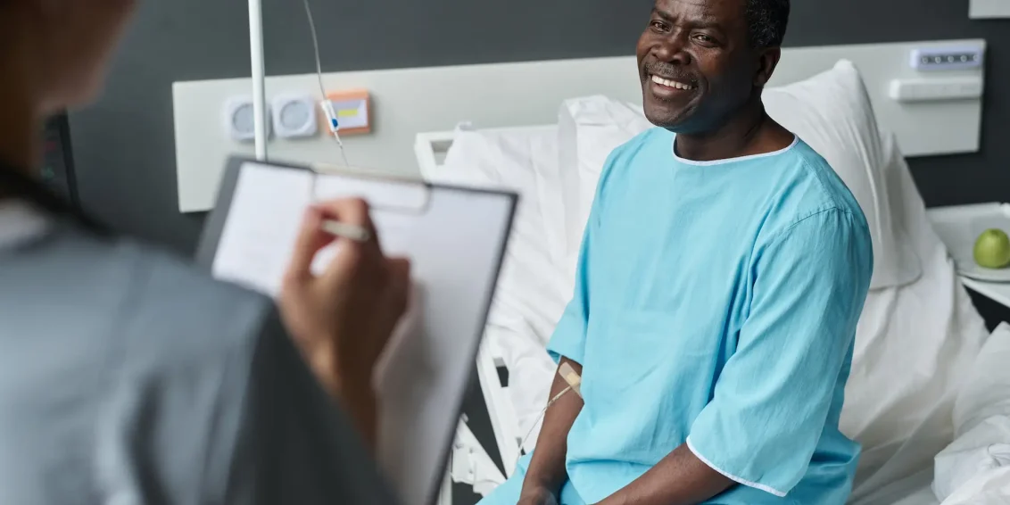 patient-talking-to-nurse-during-her-visit-2023-11-27-05-14-25-utc (1)